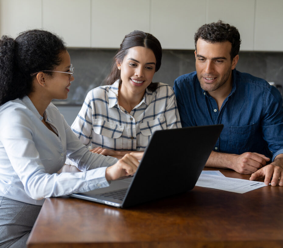 Latin American couple talking to a financial advisor about an investment - home finances concepts