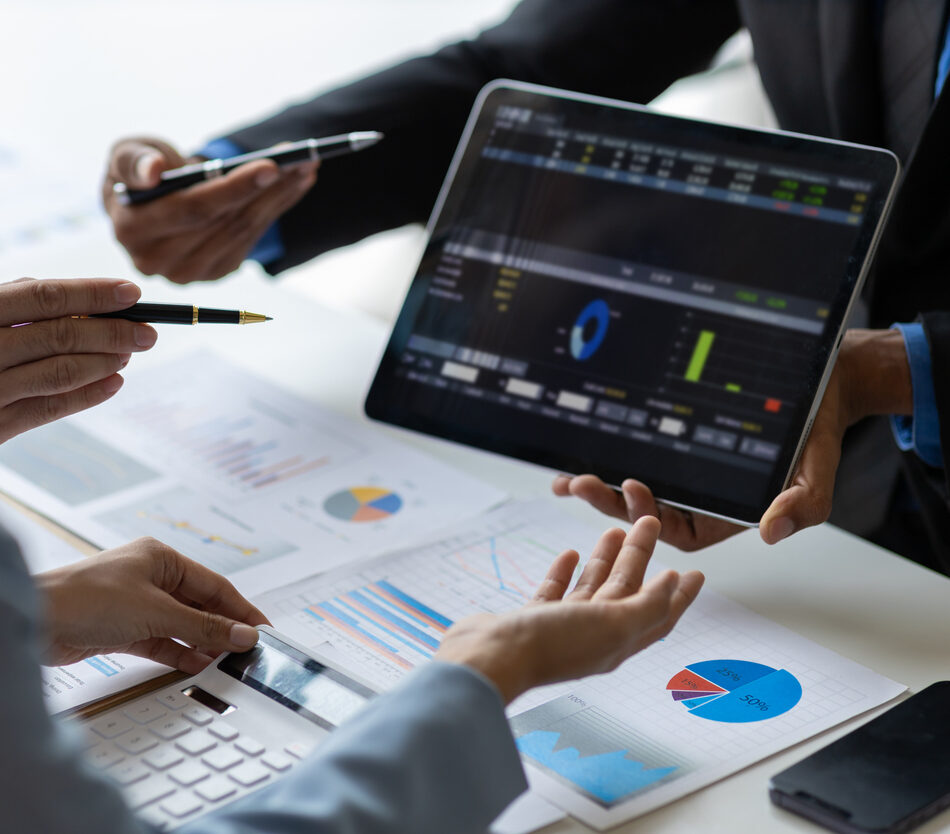 Business adviser meeting to analyze and discuss the situation on the financial report in the meeting room. Investment Consultant, Financial Consultant, Financial advisor and accounting concept.